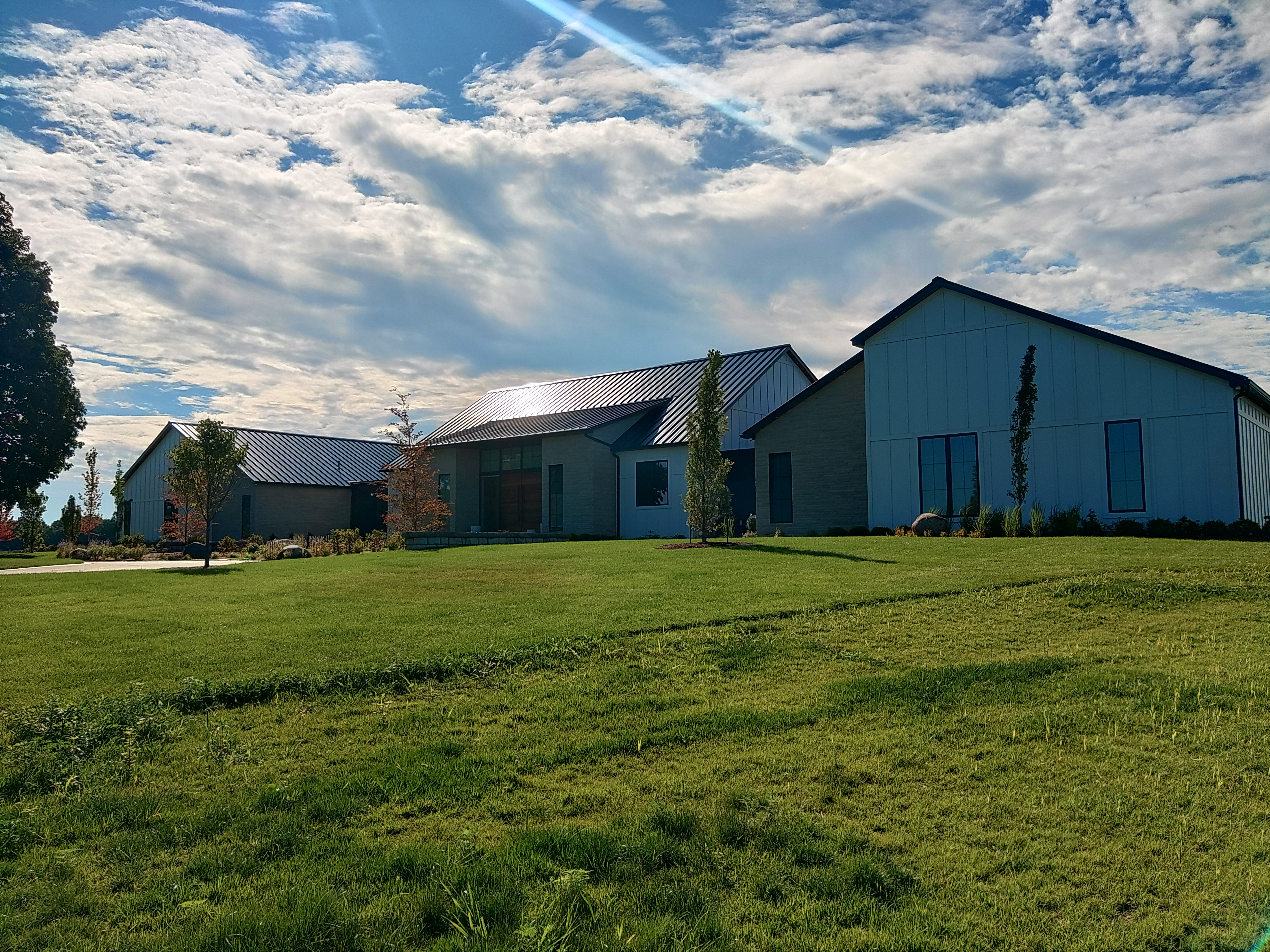 Standing seam metal roofing on a modern ranch in Suttons Bay MI