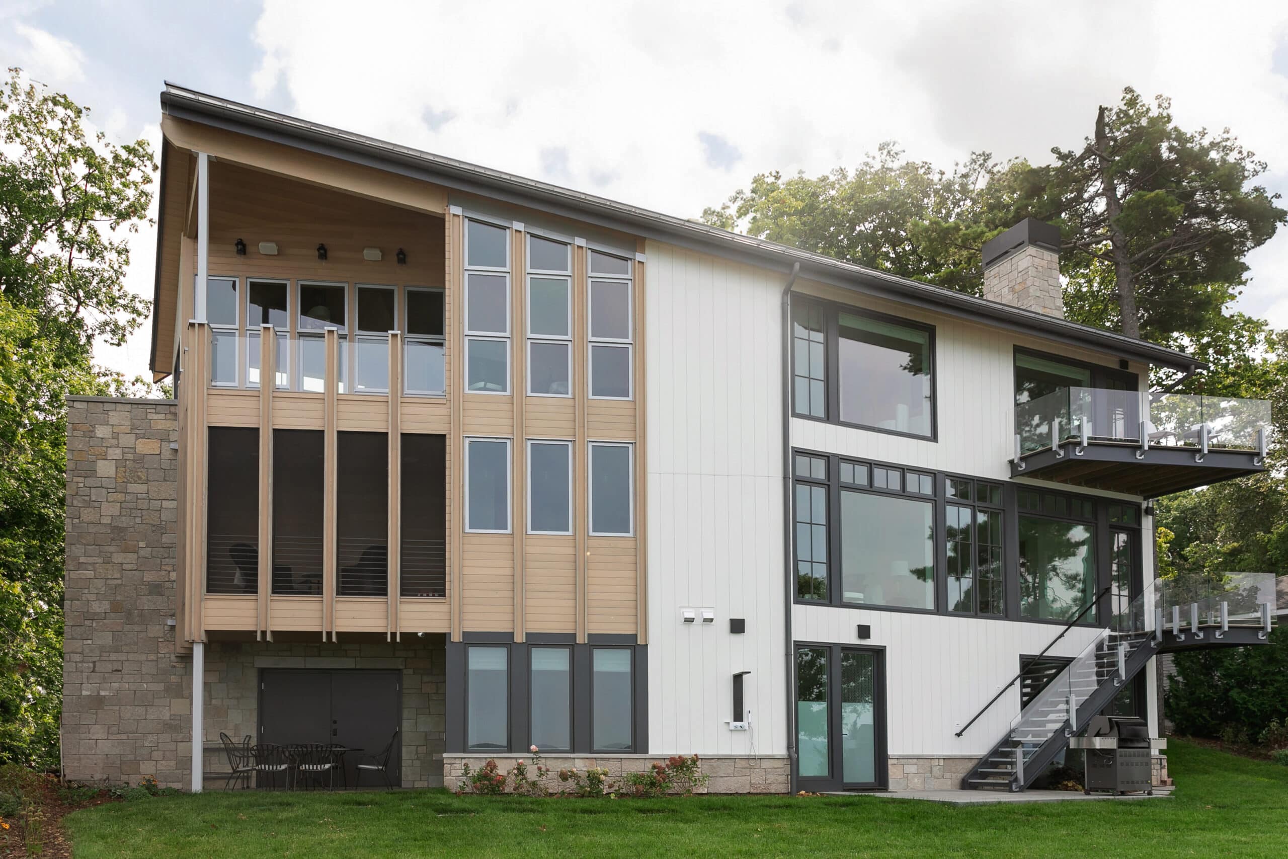 Standing seam metal roof on a modern lake home in Old Mission MI